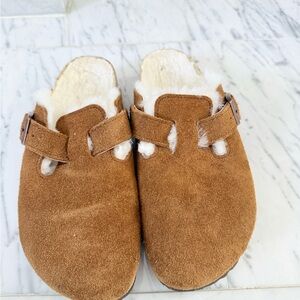 Tan suede shearling lined Birkenstock clogs